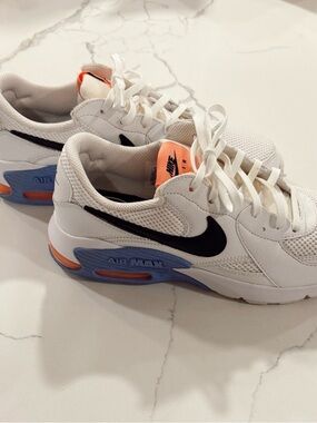 Nike White Sneakers with Black Swoosh and Blue/Pink Accents
